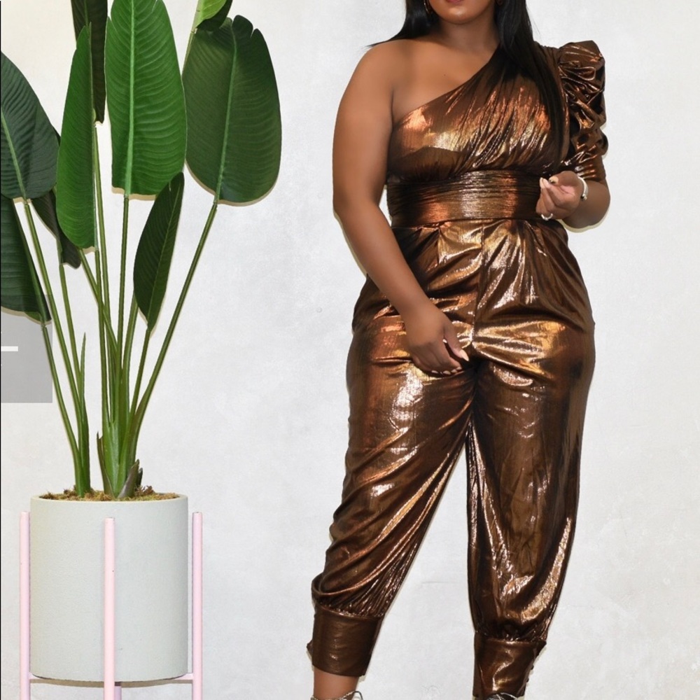 Metallic gold, size large, one shoulder jumpsuit, new with tags